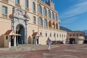 Monte Carlo - guard with Summer uniform walking in front of the Royal Palace photo
