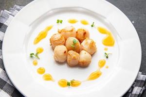 sea scallop fresh seafood fried meal food snack on the table copy space food background photo