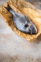 raw fish sea bream fresh seafood meal food snack on the table copy space food background photo