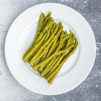 green beans asparagus ready to eat healthy meal food snack on the table copy space food background rustic top view keto or paleo diet veggie photo