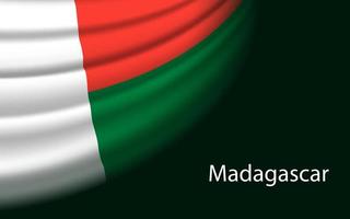 Wave flag of Madagascar on dark background. vector