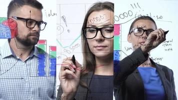 3 in 1 video. Man and woman draws various growth charts, calculating prospects for success in a modern glass office video