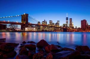 Manhattan city skyline cityscape of New York with Brooklyn Bridge