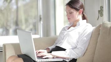 Stylish business woman working in computer video