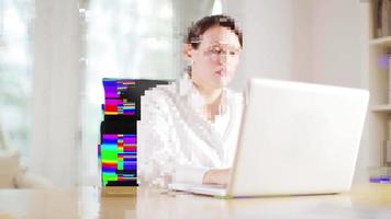 Stylish business woman working in computer with overlayed code video