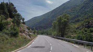 Camera attached to the front of a vehicle driving along mountain roads in spain video