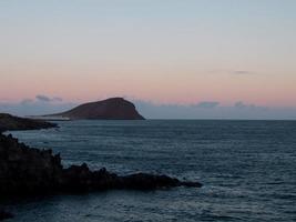 Sunset over the sea photo