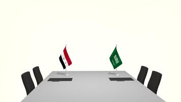 Meeting setup between Saudi and Syria, Tow countries' flag on a desk with file, pen, and, chairs,  Symbolize Mutual cooperation and foreign policy ties, diplomats business met to set up an agreement photo