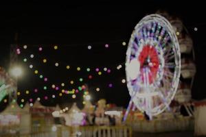 Night market blur background with colorful lights photo