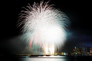 Firework with beautiful at sea. photo