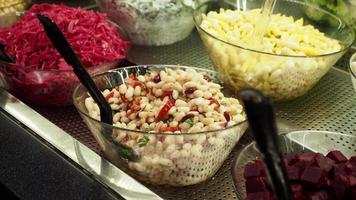 cooked white kidney beans in a bowl. video