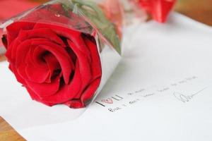 Single red rose bouquet with I Love You quotes photo