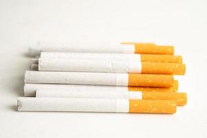 Cigarette, tobacco in roll paper with filter tube, No smoking concept. photo