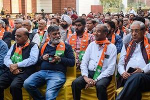 Delhi, India, December 02 2022 -Bharatiya Janata Party - BJP supporter during mega road show in support of BJP candidate Pankaj Luthara to file nomination papers ahead of MCD local body Elections 2022 photo