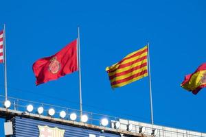 Flags of different countries and sports teams, flags with different coloured stripes. photo