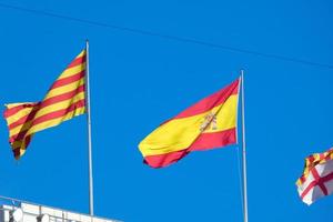 Flags of different countries and sports teams, flags with different coloured stripes. photo