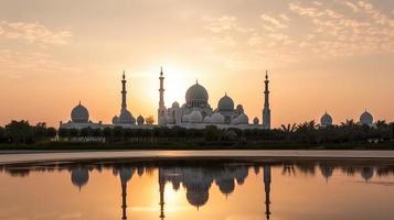 Abu Dhabi, UAE, Sheikh Zayed Grand Mosque in the Abu Dhabi, United Arab Emirates on a sunset view background. photo