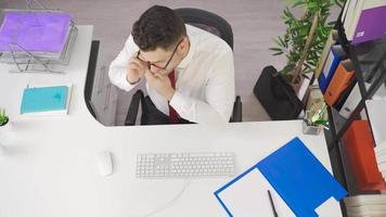 Businessman working in his office, time lapse. Time lapse of businessman working in office. video