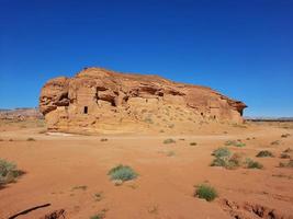 Beautiful daytime view of Al Hegra, Madain Saleh archaeological site in Al Ula, Saudi Arabia. photo