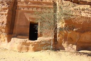 Beautiful daytime view of Al Hegra, Madain Saleh archaeological site in Al Ula, Saudi Arabia. photo