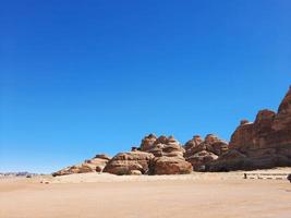 Beautiful daytime view of Al Hegra, Madain Saleh archaeological site in Al Ula, Saudi Arabia. photo