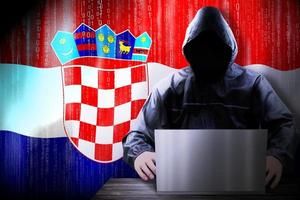 Anonymous Hooded Hacker and Flag Of Croatia, Binary Code - Cyber Attack Concept photo