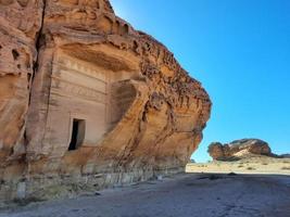 Beautiful daytime view of Al Hegra, Madain Saleh archaeological site in Al Ula, Saudi Arabia. photo