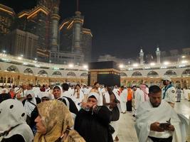 Mecca, Saudi Arabia, March 2023 - During the month of Ramadan, pilgrims from all over the world perform Tawaf around the Kabah at the Masjid al-Haram in Mecca.. photo