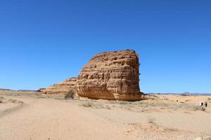 Beautiful daytime view of Al Hegra, Madain Saleh archaeological site in Al Ula, Saudi Arabia. photo