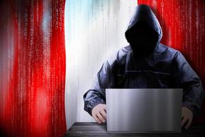 Anonymous Hooded Hacker and Flag Of Peru, Binary Code - Cyber Attack Concept photo