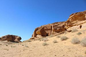 Beautiful daytime view of Al Hegra, Madain Saleh archaeological site in Al Ula, Saudi Arabia. photo