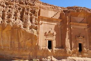 Beautiful daytime view of Al Hegra, Madain Saleh archaeological site in Al Ula, Saudi Arabia. photo