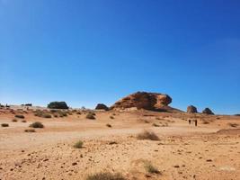 Beautiful daytime view of Al Hegra, Madain Saleh archaeological site in Al Ula, Saudi Arabia. photo