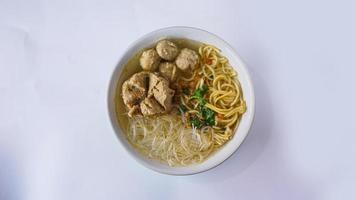 bakso super top view, meatball soup with noodles, indonesian cuisine photo