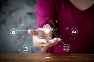Cloud computing technology and internet of things concept. woman with cloud computing diagram show on hand. Cloud technology. Data storage. Networking and internet service concept. photo