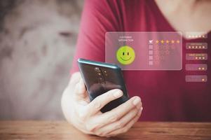 Customer review concept. User give rating to service experience on online application, Customer can evaluate quality of service leading to reputation ranking of business. photo