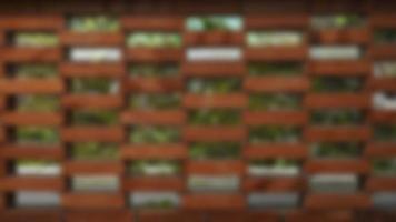 Blurred background of The roster brick arrangement is made hollow so that air can flow inside and create fresh air in the garden photo