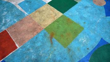Abstract art of painting on the floor in an elementary school field photo