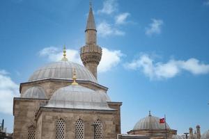 a beautiful mosque against blue sky photo