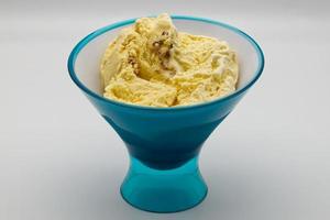 Blue bowl of Italian Vanilla Bourbon ice cream. photo