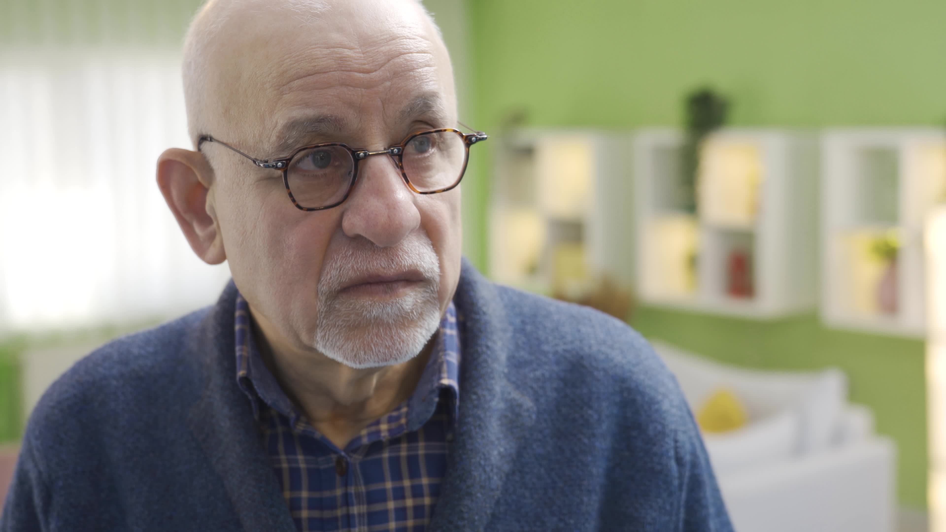 Worried Thoughtful Old Adult Man At Home Alone In Front Of Mirror worried-thoughtful-old-adult-man-at-home-alone-in-front-of-mirror