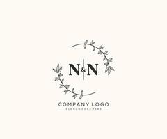 initial NN letters Beautiful floral feminine editable premade monoline logo suitable for spa salon skin hair beauty boutique and cosmetic company. vector