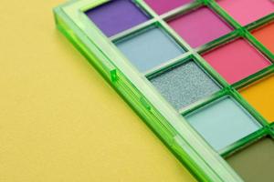 Bright summer eyeshadow palette with greens and reds photo