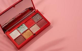 Bright summer eyeshadow palette with greens and reds photo