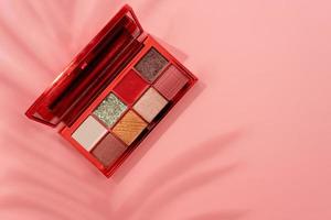 Bright summer eyeshadow palette with greens and reds photo