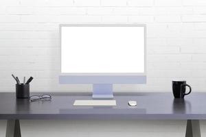 Modern computer display on office desk. Isolated screen for web page mockup promotion photo