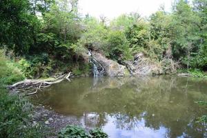 Lake with a Dry Waterfall photo