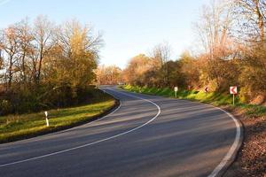 Serpentine Road in low Autumn sun photo