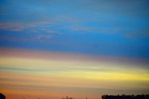 yellow and orange lines in sunset sky photo