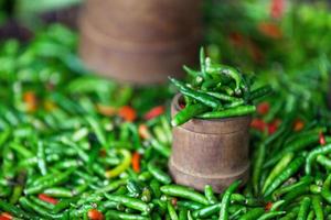 Stack of Piment oiseau on a market stall photo